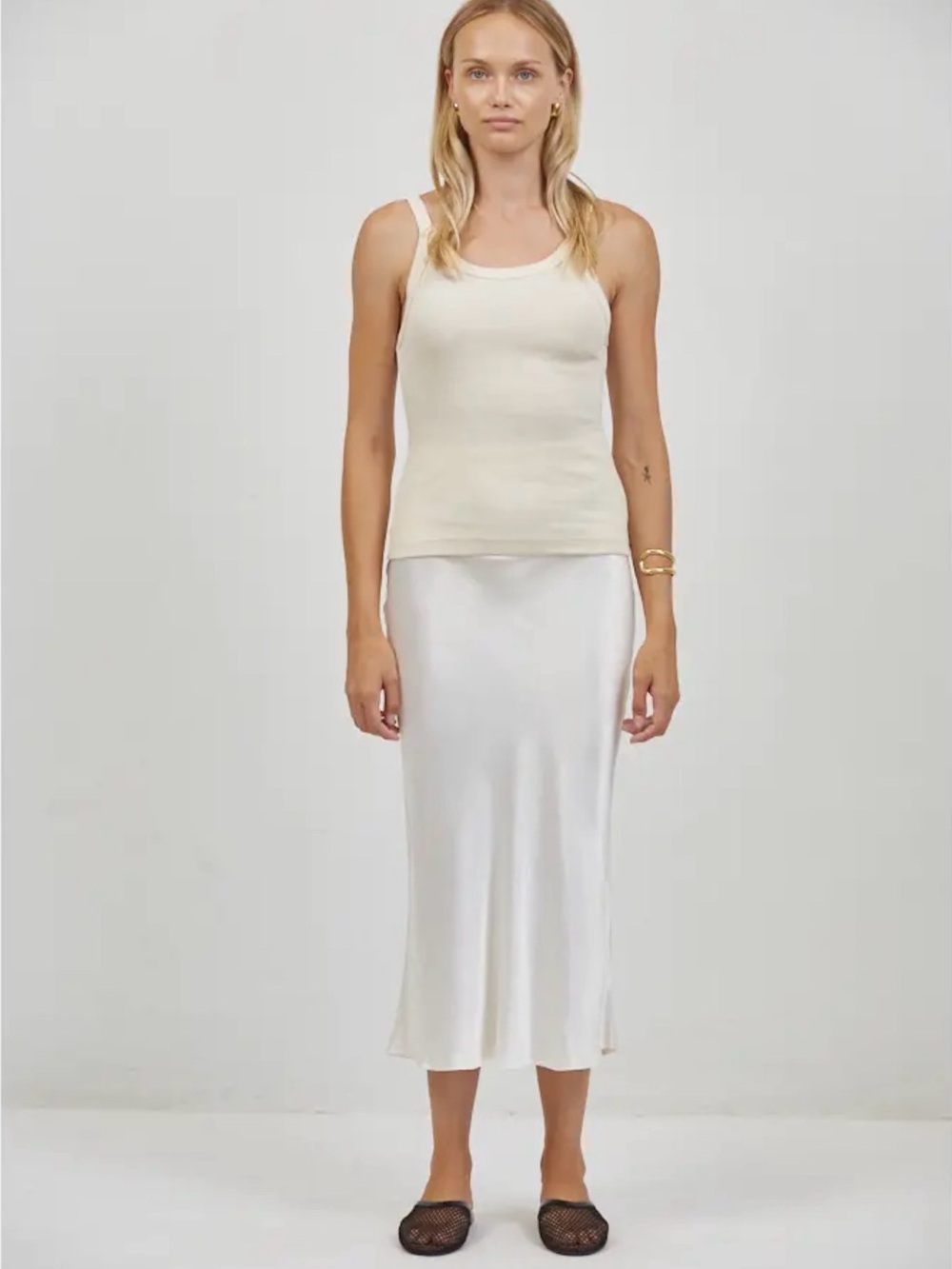 A. Ren organic cotton tank in cream. The perfect staple.